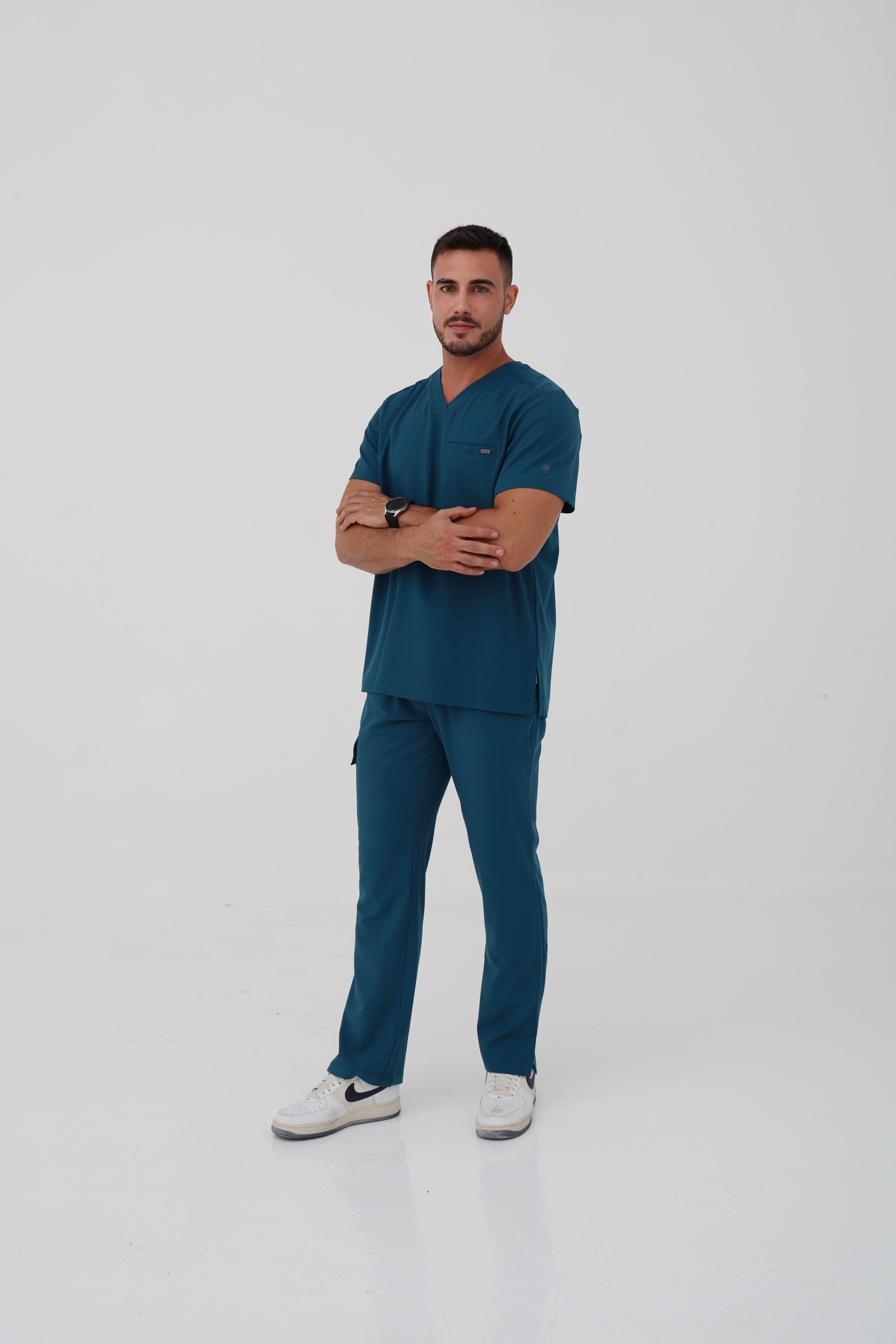 Ari V-Neck Scrub Top in Caribbean Blue – Men | Healing Hands