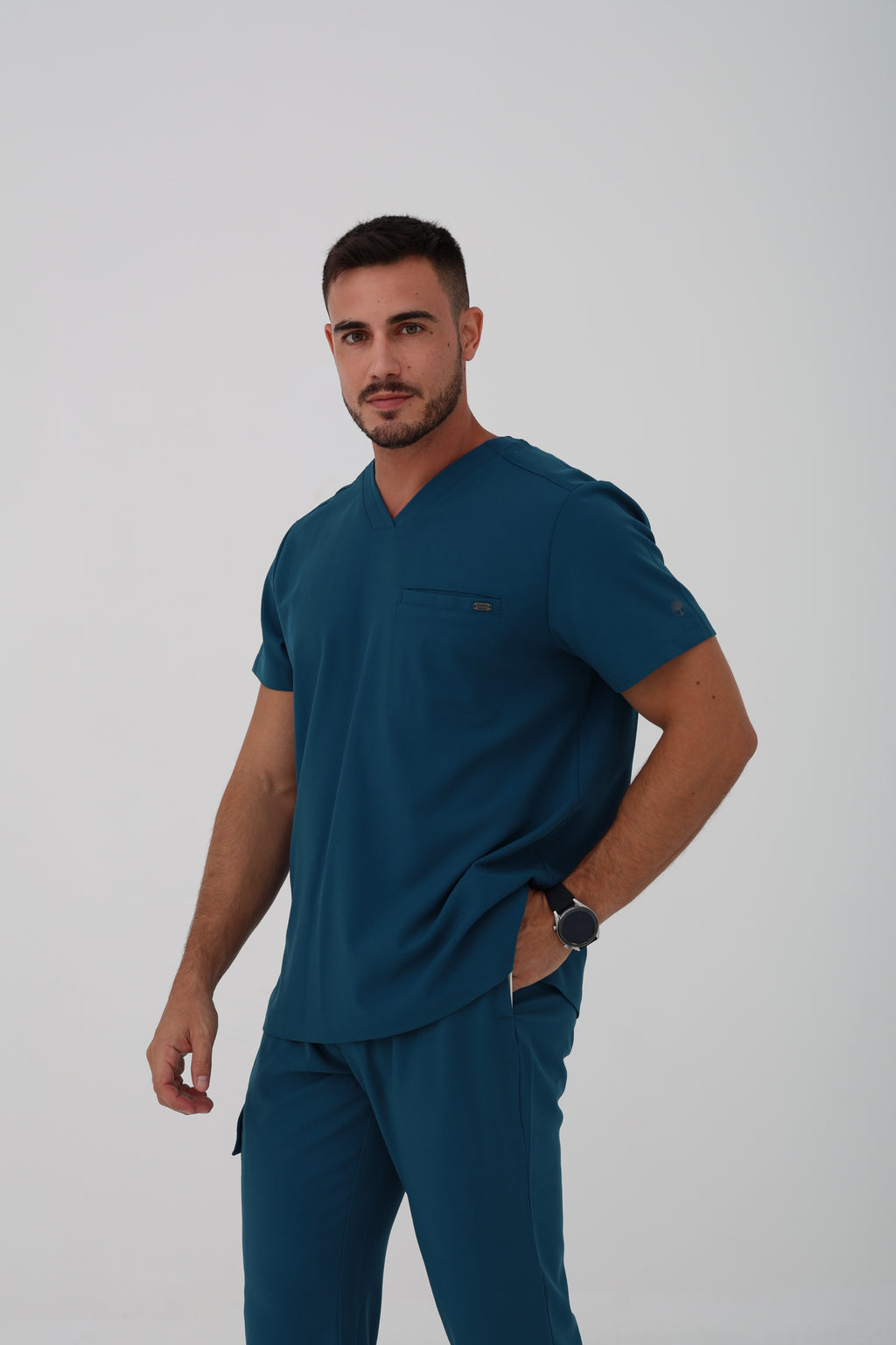Ari V-Neck Scrub Top in Caribbean Blue – Men | Healing Hands