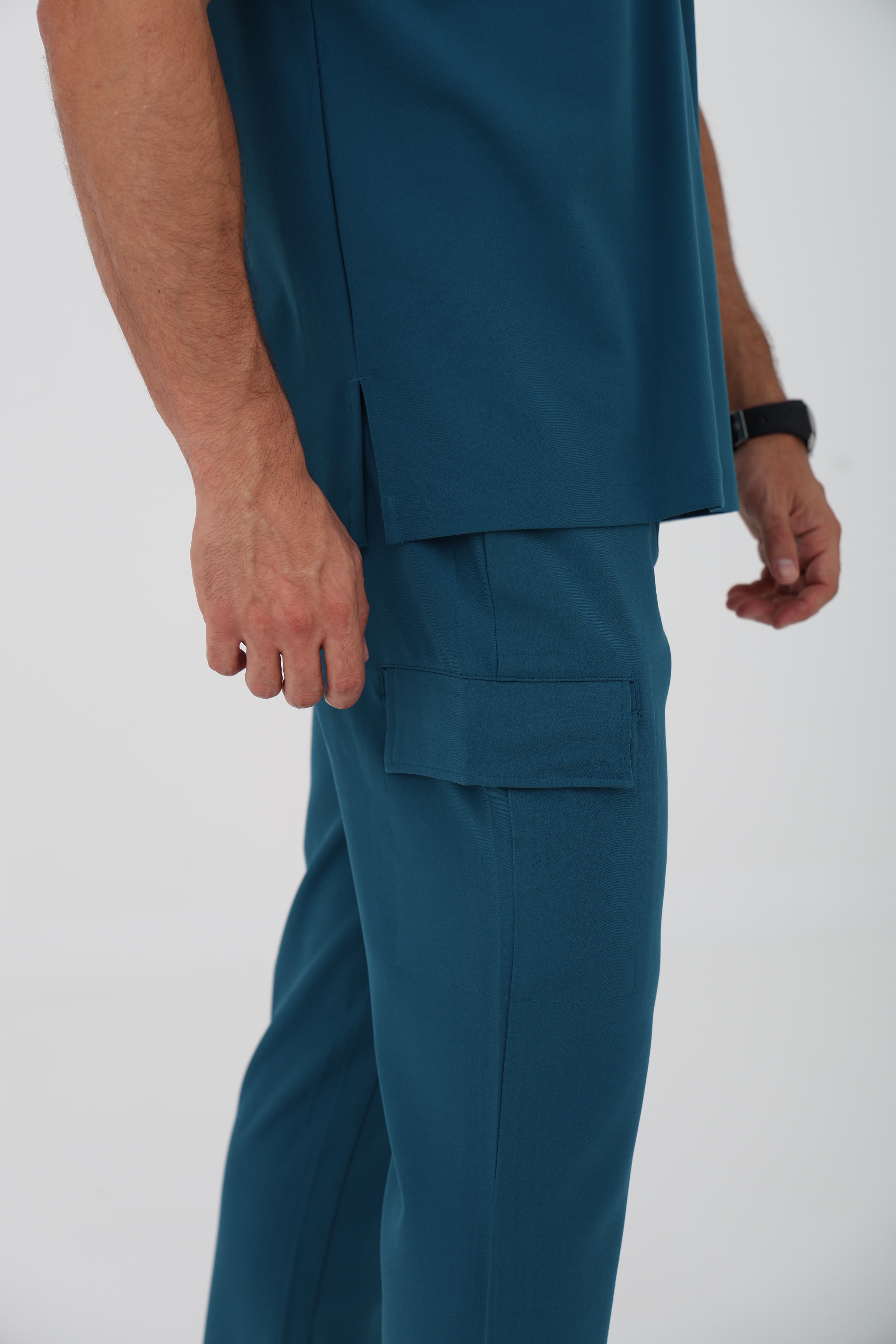 Ari V-Neck Scrub Top in Caribbean Blue – Men | Healing Hands